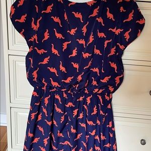 Cute ModCloth and orange dinosaur dress.